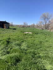 View of yard with a view of countryside