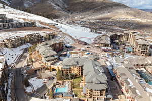 Snowy aerial view with a mountain view
