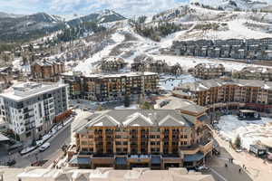 Snowy aerial view with a mountain view