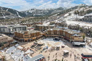 Snowy aerial view with a mountain view