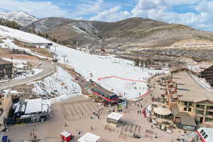 Snowy aerial view featuring a mountain view