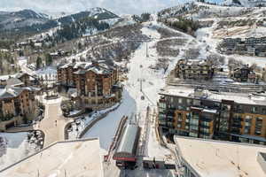 Snowy aerial view with a mountain view