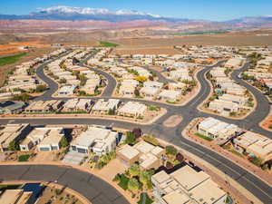 View of property location with a mountainous background and nearby suburban area