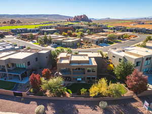 Aerial view of residential area featuring a mountain backdrop