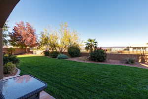Fenced backyard featuring a patio area