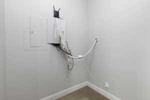 Detailed view of electric panel and carpet flooring