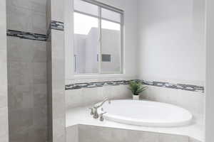 Primary full bathroom featuring a garden tub