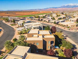 Aerial view of residential area with a mountain backdrop