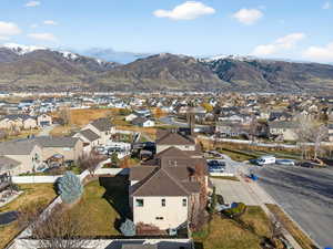 Aerial view of residential area featuring mountains