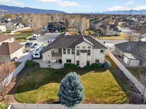 Aerial perspective of suburban area with a mountain backdrop