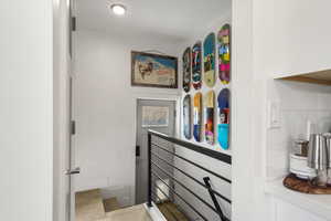 Walk in closet with light tile patterned floors