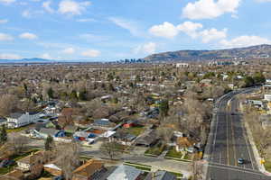 Aerial view of residential area with a mountainous background