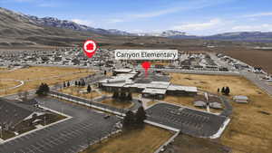 Aerial overview of property's location with a mountain backdrop
