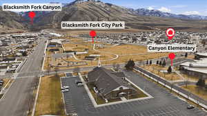 Aerial view of property's location with mountains