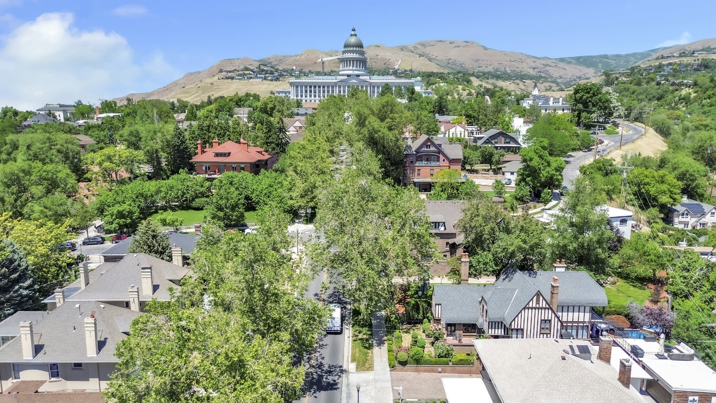 Aerial view of residential area with a mountainous background