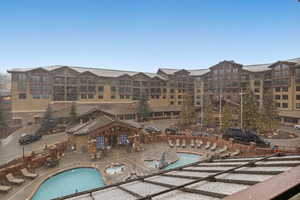 Community pool featuring a patio area