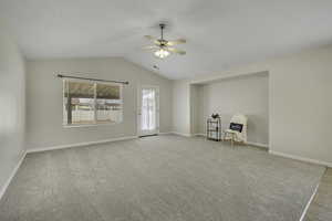 Unfurnished room featuring light carpet and ceiling fan