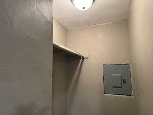 Walk in closet with electric panel