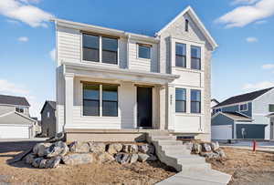 View of front of property featuring covered porch