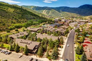 Aerial view of residential area featuring a mountain backdrop