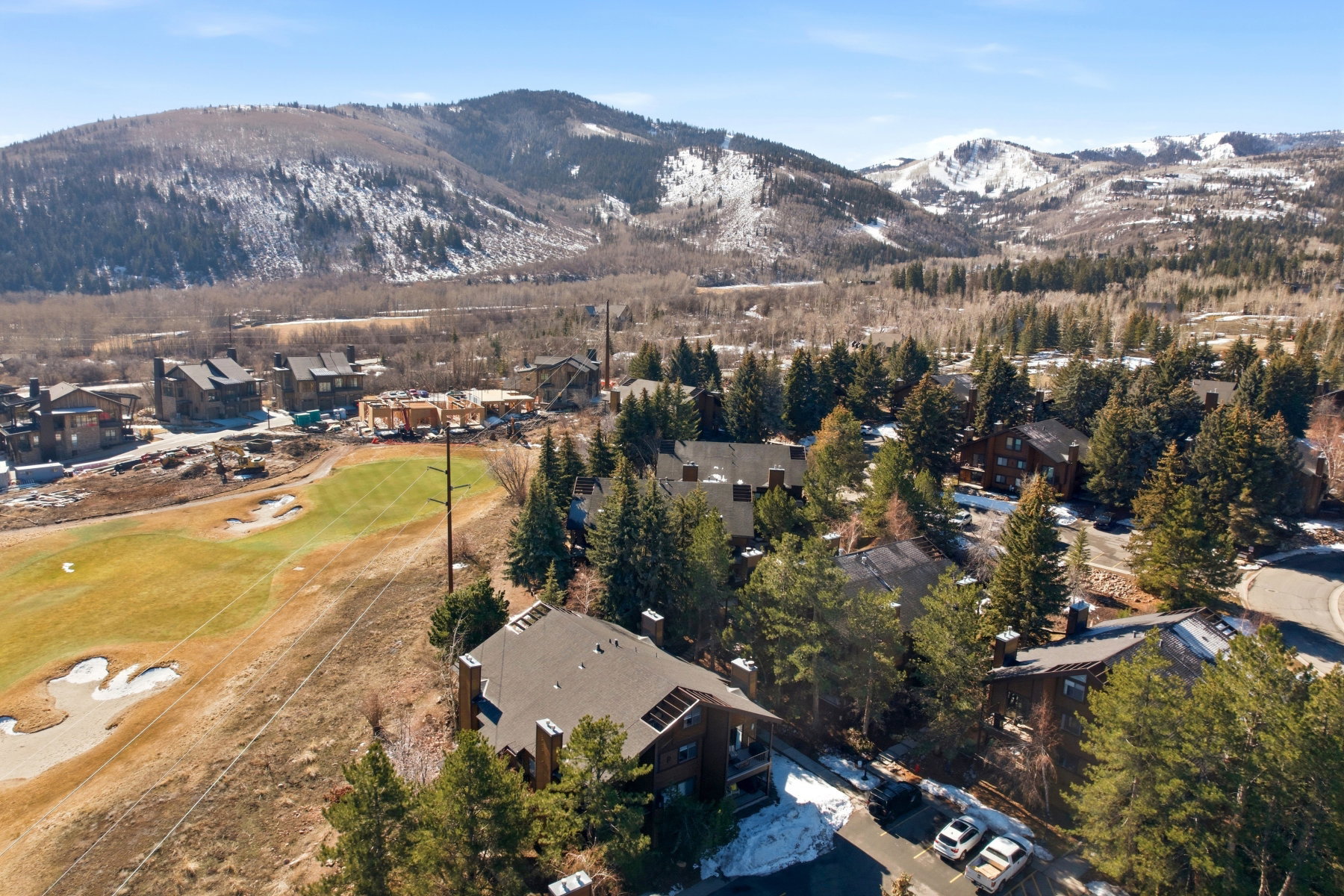 View of property location featuring nearby suburban area and a mountainous background