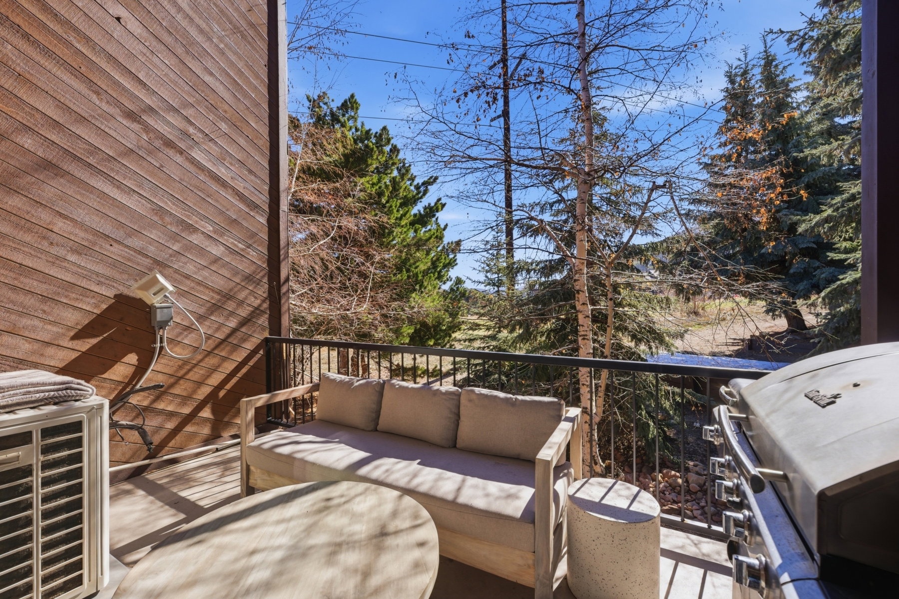 Balcony featuring grilling area and an outdoor living space