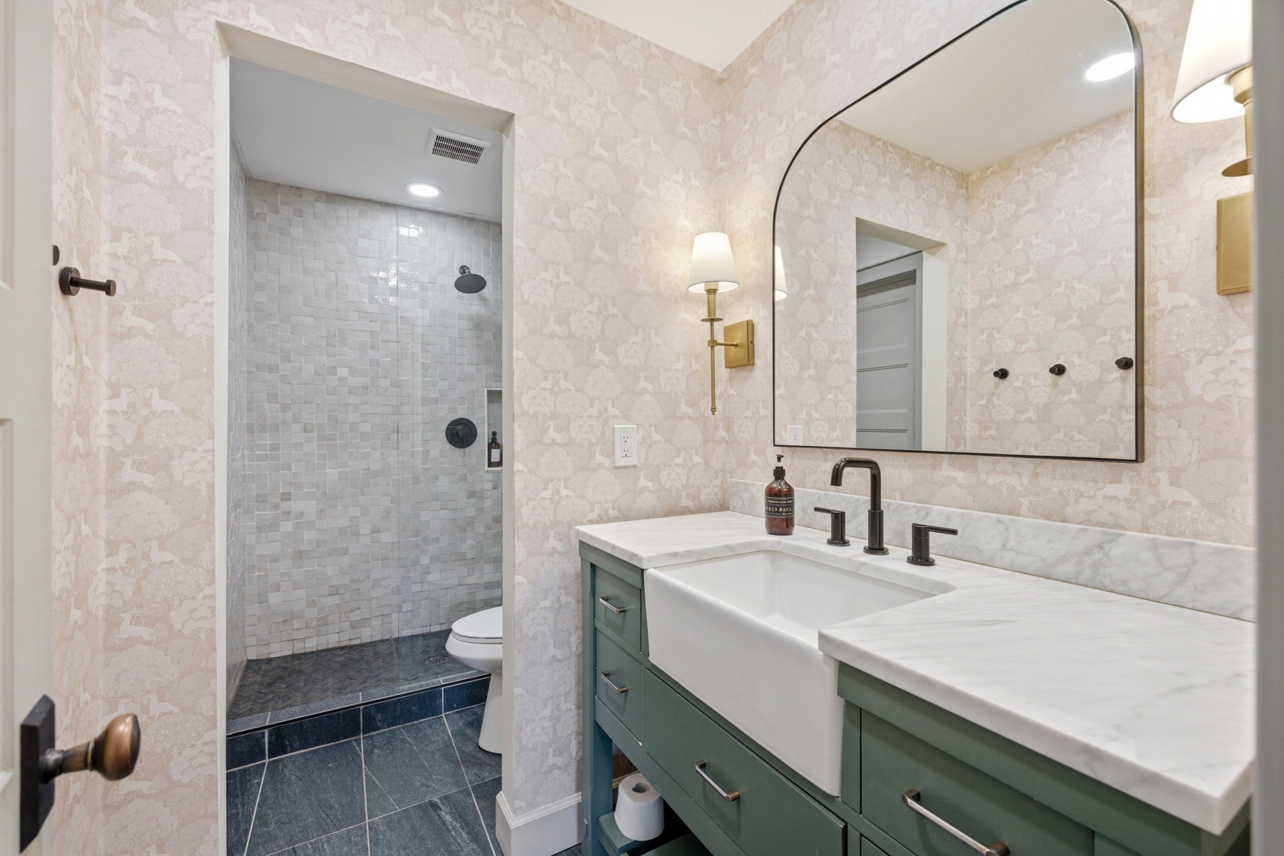 Bathroom with vanity, walk in shower, and recessed lighting