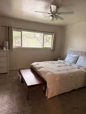 Bedroom featuring carpet floors and a ceiling fan