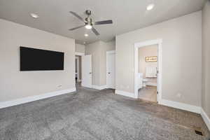 Unfurnished bedroom with light carpet, recessed lighting, ceiling fan, and ensuite bath