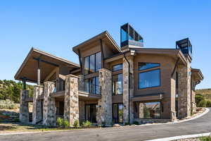 View of front of home with stone siding