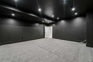 Spare room featuring carpet flooring and recessed lighting