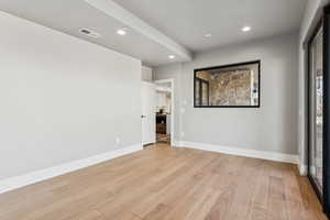 Unfurnished bedroom with recessed lighting and light wood-style floors