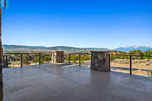 View of patio with a mountain view
