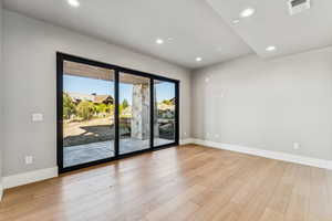 Spare room featuring recessed lighting and light wood finished floors