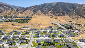 Aerial view of residential area featuring mountains