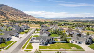 Aerial view of residential area with a mountainous background