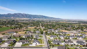 Aerial view of residential area featuring mountains
