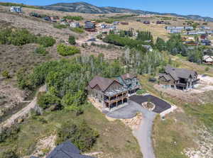 Aerial view of residential area featuring mountains