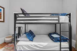 Bedroom with wood finished floors