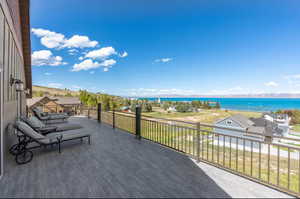 View of patio with a water view