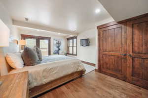 Bedroom featuring light wood finished floors and recessed lighting