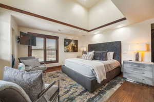 Bedroom with wood-type flooring