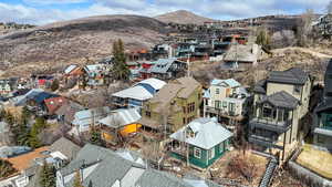 Aerial view of residential area with mountains