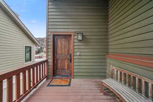 Property entrance featuring a deck