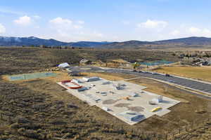 Aerial view of sparsely populated area with mountains