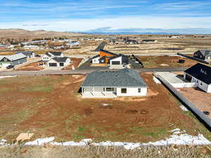 Aerial view of residential area featuring mountains