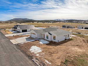 Aerial view of residential area with a mountain backdrop