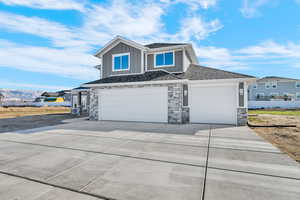 Huge 3 car+, extra deep garage and expansive driveway