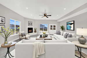Light filled great room with a cozy fireplace.