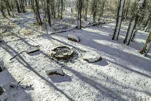 View of yard covered in snow
